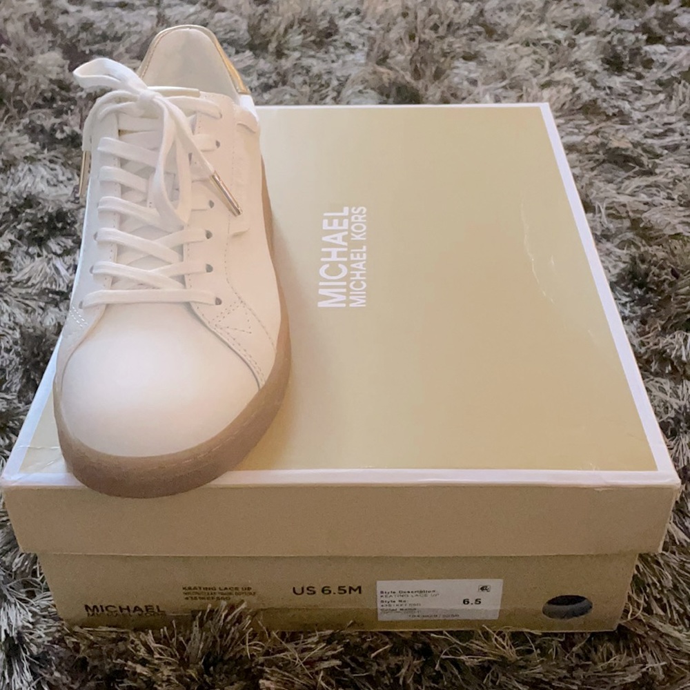 Lace up white leather sneakers